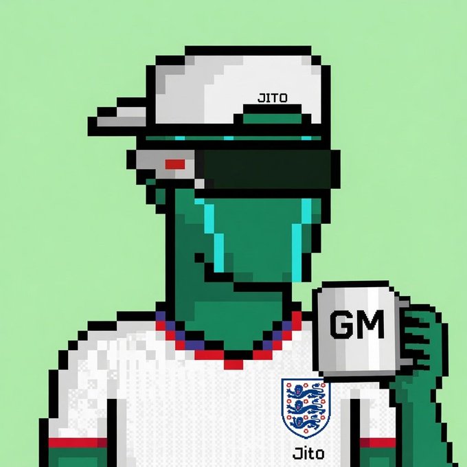 A pixel art illustration of a green frog character wearing a cap labeled 'JITO' and an England football jersey, holding a mug that says 'GM' with 'Jito' written below.