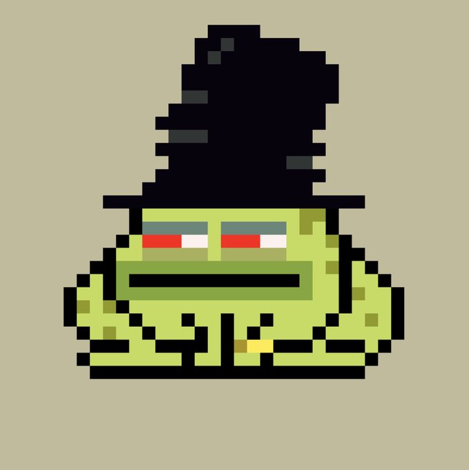 A pixel art image shows a green character with a wide mouth and red eyes wearing a black witch's hat.