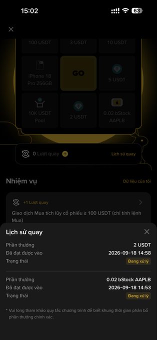 A Vietnamese cryptocurrency app screen showing a 'Lucky draw' (Lịch sử quay) interface with rewards like 100 USDT, iPhone 18 Pro, and 2 USDT options, displaying transaction history and a balance of 0 Lướt quay.