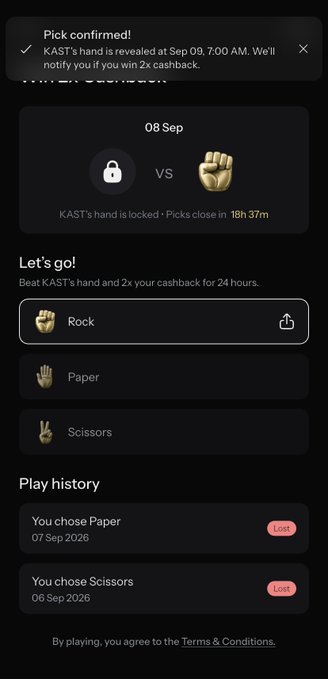 A mobile app screen for a rock-paper-scissors game called KAST, showing a confirmed pick notification and options to choose Rock, Paper, or Scissors to beat KAST's locked hand for 2x cashback, with recent play history showing losses.