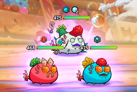 A colorful battle scene from a video game showing three cartoonish monsters with fruits and decorations on their heads, displaying health bars with values 475, 468, and 475.