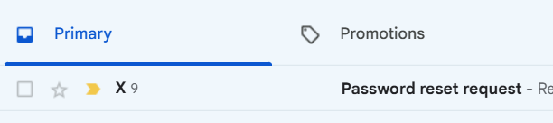 A close-up of an email inbox showing a starred 'Password reset request' message in the Primary tab.