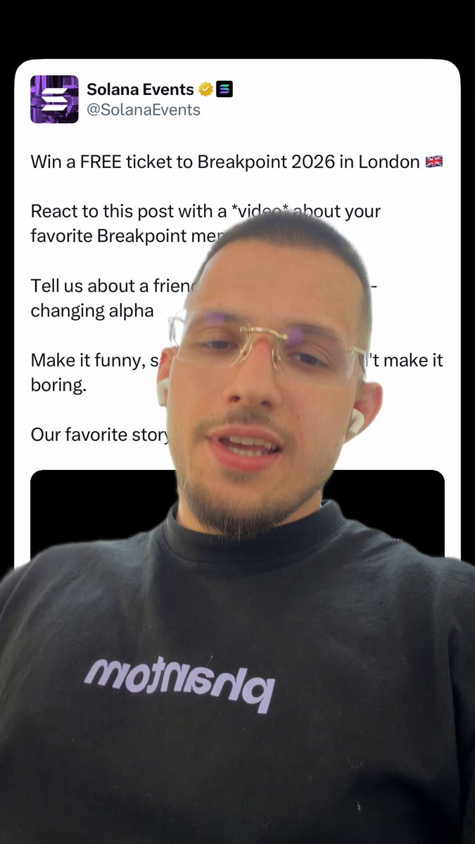 The image shows a man wearing glasses sitting down with his face displayed on a computer screen. The text on the screen reads "Win a Free ticket to Breakpoint 2026 in London! Reject this post with your own message about a friend changing their mind, or tell us about a favorite breakpoint moment".