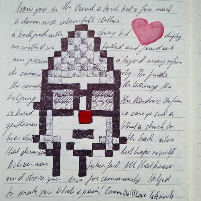 A handwritten note in cursive surrounding a pixelated drawing of a cross or castle-like figure with a red heart, appearing to be a page from a journal or notebook.