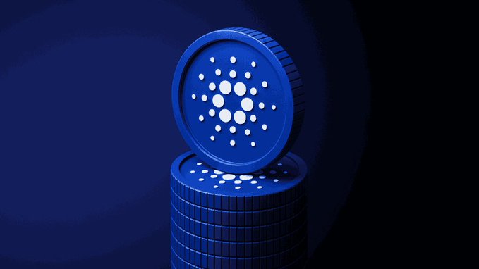 The image features a stack of blue coins, with one coin placed on top of another. The text "カルダノのプロジェクトで大規模なハッキングですね 万ドル以上が流出とのこと CardanoエコシステムのプロジェクトであるSecondFiが、ウォレット生成ソフトウェアの欠陥を突かれています". The stack of coins is positioned in such a way that it appears to be floating or levitating, creating an interesting visual effect. This image could potentially be related to the post about Bitcoin and its value, as it showcases the concept of digital currency and how it can be represented visually through objects like the blue coins.