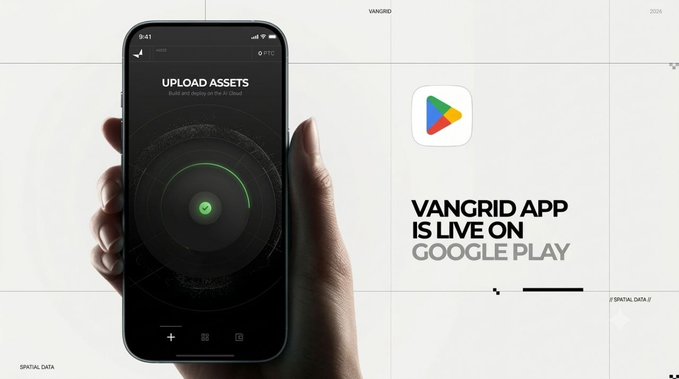 Promotional image for 'VANGRID APP' showing a hand holding a smartphone displaying 'UPLOAD ASSETS' screen with a green checkmark, alongside the Google Play logo and text 'VANGRID APP IS LIVE ON GOOGLE PLAY'.