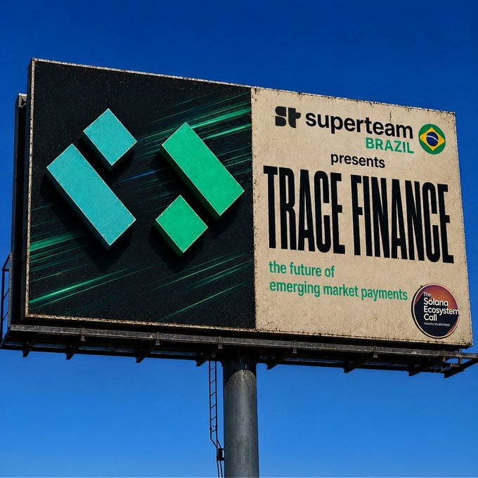 A billboard advertisement for 'Superteam Brazil' promoting 'TRADE FINANCE - the future of emerging market payments' featuring a green geometric logo against a blue sky.
