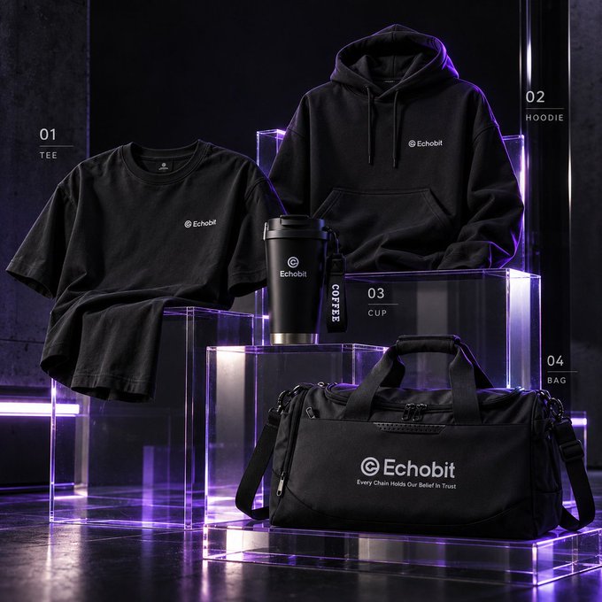 A promotional display showcasing Echobit branded merchandise including a black t-shirt, hoodie, coffee cup, and bag, with the tagline 'Every Chain Holds Our Belief In Trust'.