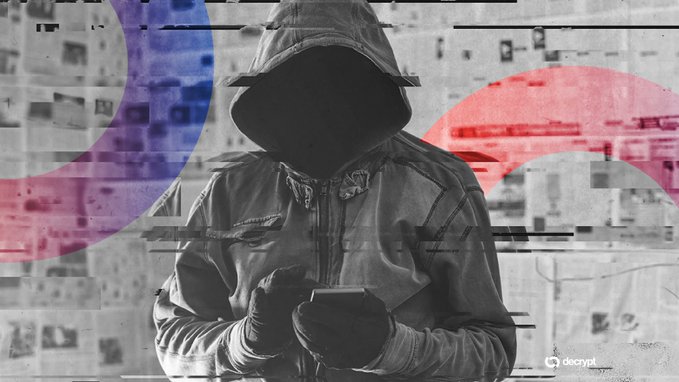 A stylized black-and-white image of a hooded figure looking at a phone, with glitch effects and red/blue circles in the background, branded with 'decrypt'.