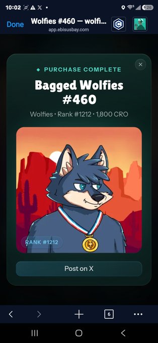 A mobile screenshot shows a 'PURCHASE COMPLETE' notification for 'Bagged Wolfies #460' with rank #1212 at a cost of 1,800 CRO. The image features a cartoon wolf character wearing a gold medal, set against a desert background, with a 'Post on X' button at the bottom.