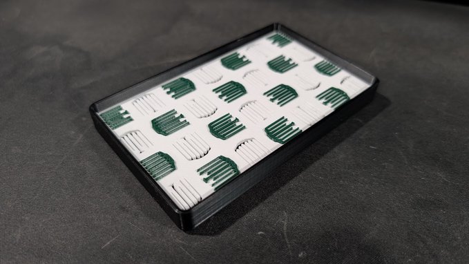 A black tray filled with neatly stacked stacks of green and white poker chips, suggesting a successful outcome at a card game. The organized arrangement of chips and the accompanying "Great success!" caption evoke a sense of triumph and reward.
