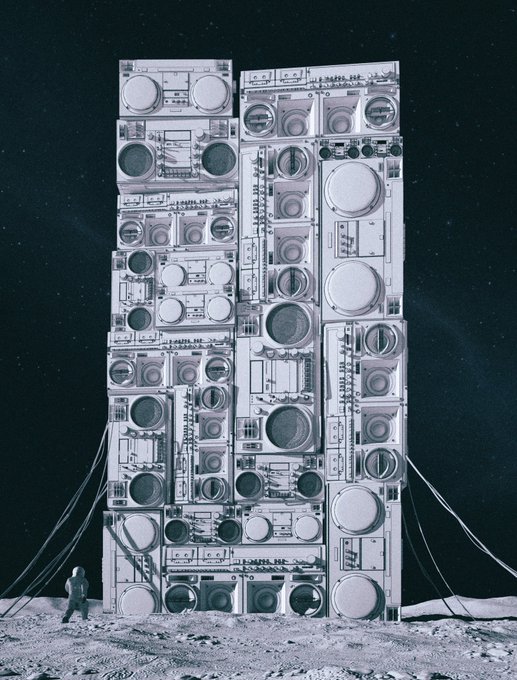 A towering, intricate structure of stacked electronic components rises from a barren, lunar-like surface, dwarfing the small astronaut figure standing at its base. The piece evokes a futuristic monument to technology, complementing the post's sentiment about the piece predating NFTs yet now finding its place in the Kanbas collection amid the endless possibilities of technology.