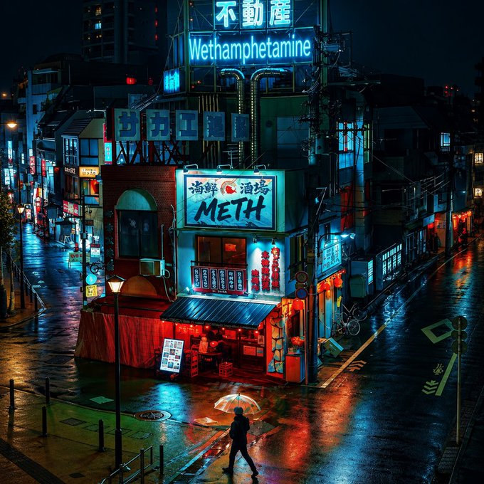 A neon-lit cyberpunk cityscape at night with a person holding an umbrella crossing a wet street; signs read 'Wethamphetamine', 'METH', and Japanese characters '不動産' and '酒場'.