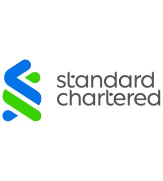 The image displays the Standard Chartered logo, featuring its signature blue and green geometric "S" emblem alongside the company's name in dark gray lowercase text. The logo relates to the accompanying post, which cites Standard Chartered's bullish Bitcoin price prediction of potentially surpassing $100,000 by year-end.