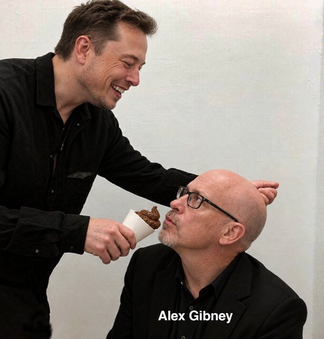 Photo of Elon Musk laughing and feeding a piece of food to a seated bald man with glasses, labeled 'Alex Gibney' in text overlay.
