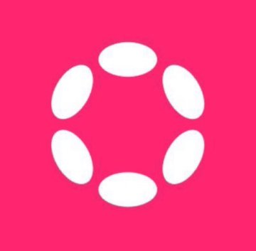 The image features a pink background with six white oval shapes arranged in a circular pattern, resembling a loading or progress spinner. This visual ties into the post's optimistic tone about Polkadot ($DOT), with the circular arrangement symbolizing forward momentum or a bullish outlook despite the token's 98% drop from its all-time high.