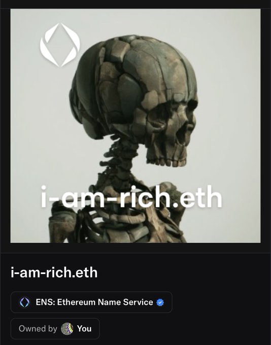 A screenshot of an Ethereum Name Service (ENS) NFT listing for 'i-am-rich.eth', showing ownership details and a profile picture featuring a metallic skull sculpture.
