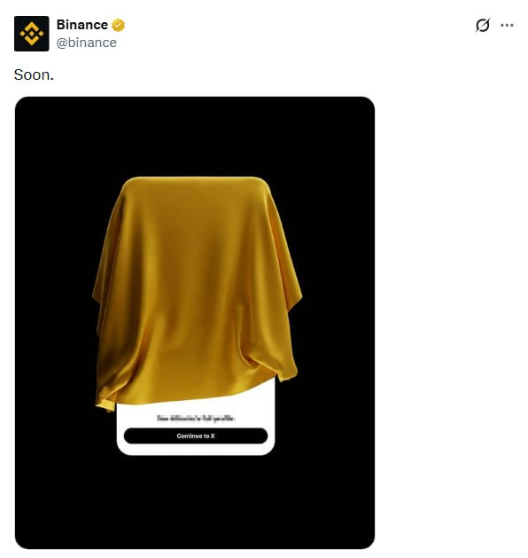 A tweet from Binance (@binance) saying 'Soon.' featuring an image of an object covered by a golden cloth with a 'Continue to X' button below.