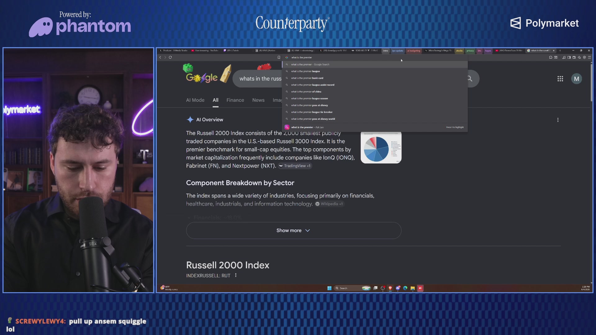 The image shows a man wearing a black shirt, sitting behind a microphone with his eyes focused on the camera. The background of the image features a computer screen displaying a webpage or blog post titled "LIVE: Bitcoin To ZERO!!! Quantum IPO Is CRAZY! Can Trump Save Us?! SpaceX! AAAAAAA JOIN on twitch to chat link below". This man appears to be participating in an online event, possibly discussing the content displayed on the screen.