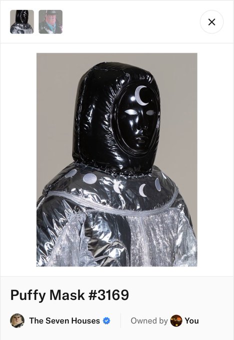 An NFT listing page showing 'Puffy Mask #3169', owned by 'The Seven Houses' (verified) and the user, depicting a hooded figure with a moon-faced mask.