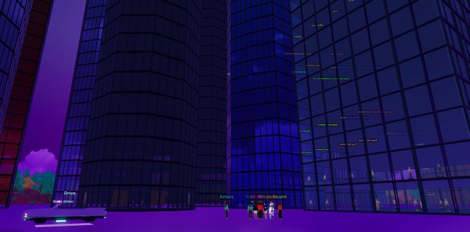 Screenshot from a 3D virtual world or video game showing modern glass skyscrapers against a purple sky, with small player avatars gathered in a plaza area.