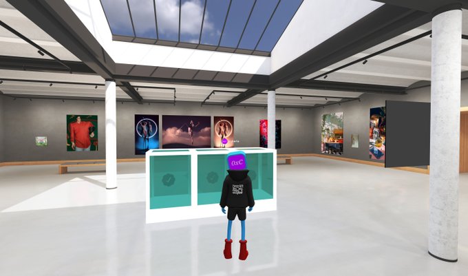 A 3D virtual gallery space with an avatar wearing a purple 'CGC' helmet and a hoodie, standing near display cases with artwork on the walls.