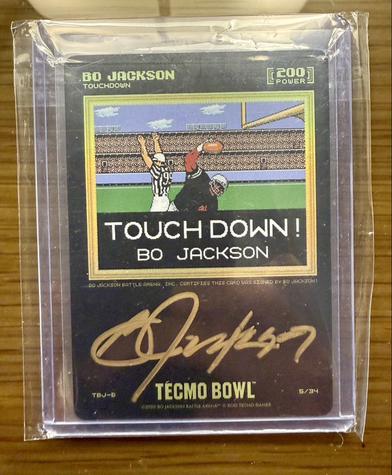 A limited edition 2020 Bo Jackson Battle Arena Tecmo Bowl trading card numbered 5/34, still sealed in its protective sleeve, featuring pixelated "TOUCHDOWN!" artwork, Bo's signature, and a 200 "POWER" rating. The "/34 Club" reference in the post aligns with the card's serial number of 5/34, marking it as a rare collectible for Bo Jackson fans.