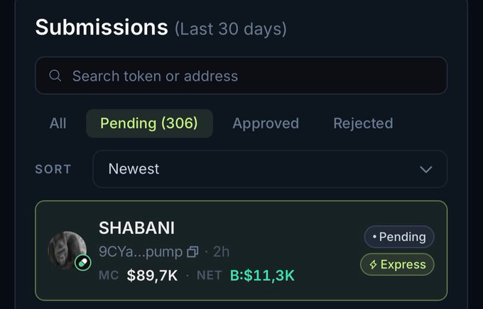 A screenshot of a social media application displaying the submission status with "Submissions" listed at the top, "Last 30 days" below it, "Search token or address" in the middle, and a submitter's name in the bottom right corner. There is also a summary about an account named 'Shabani' that was created on '9/9CYa...pump'. A user can see how long this submission has been waiting for approval before they accept or reject it. The post appears to be for some sort of social media listing, as indicated by the wording in the image and what is shown above and below the submission button.