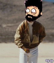 A meme/GIF image of a man with an edited cartoonish face featuring large googly eyes and a beard, wearing a brown jacket with 'Gif Sly' watermark text.