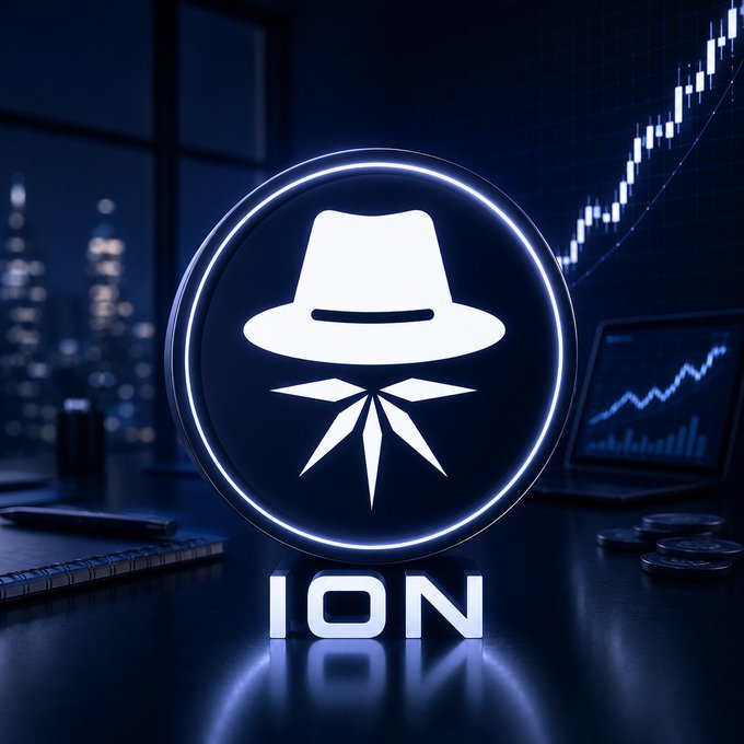 A digital rendering of the Monero (XMR) cryptocurrency logo featuring a stylized fedora-wearing face, presented in glowing white against a dark blue background with the text 'ION' below and a candlestick trading chart visible.