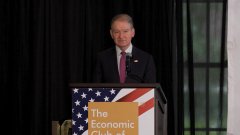 SEC Chair Paul Atkins stands at a podium labeled "The Economic Club," speaking at an event that contextualizes the post's claim about tokenized securities and Ondo Finance's role in pioneering blockchain-based financial instruments.