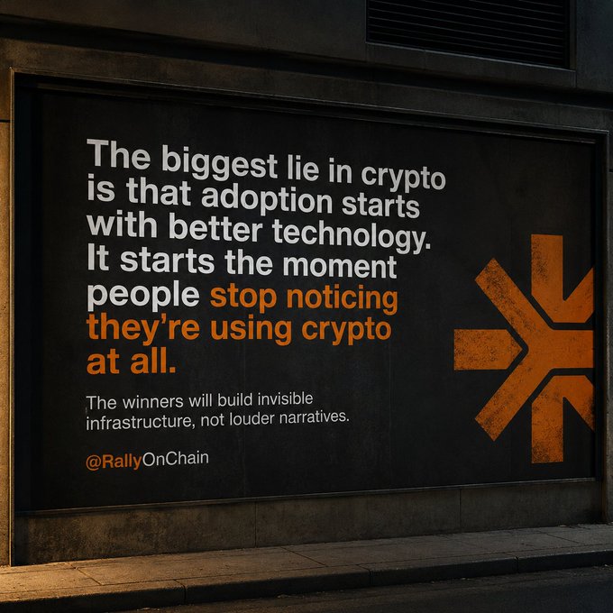 A dark billboard advertisement stating 'The biggest lie in crypto is that adoption starts with better technology. It starts the moment people stop noticing they're using crypto at all. The winners will build invisible infrastructure, not louder narratives.' credited to @RallyOnChain.