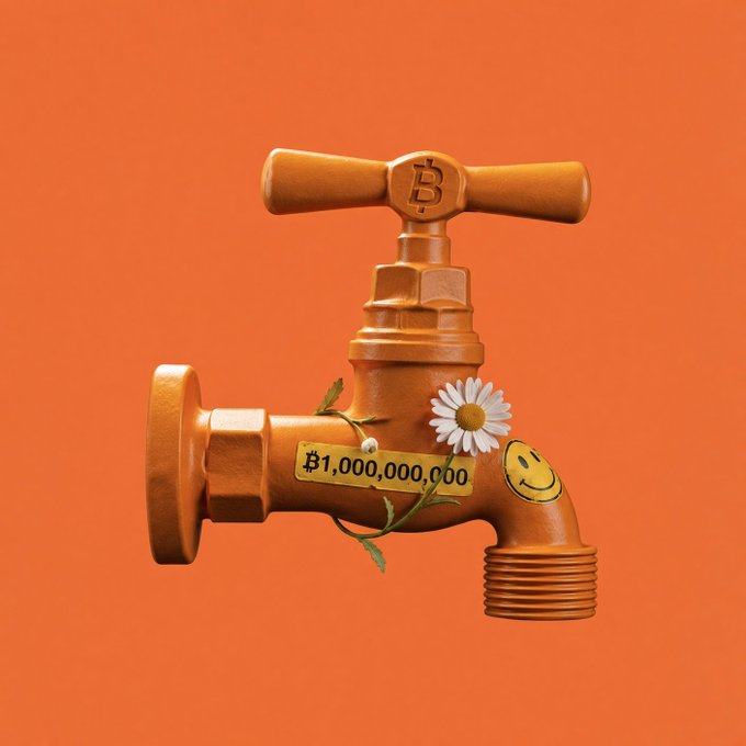 A gold-colored faucet decorated with a white daisy, green vines, a smiley sticker, and a Bitcoin symbol sits against an orange background; its label reads “₿1,000,000,000.”