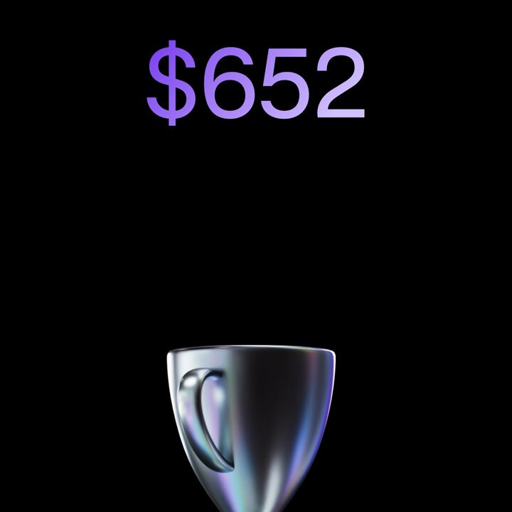 The image features a silver cup sitting on a table against a black background, with the cup's handle sticking out from its side. The cup seems to be a coffee mug or a drink coaster placed over a picture of a cup that appears to contain $15,000 in US dollars. The image also contains text related to space exploration and a post about an auction called "The SpaceX Pre-IPO Challenge".
In the caption below this image, there is a link which provides further information on the auction.