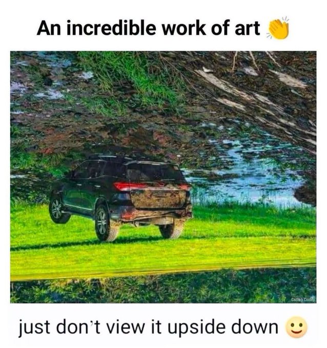 A meme captioned 'An incredible work of art' with a clapping emoji features a muddy SUV driving on grass, followed by the text 'just don't view it upside down' with a smiley face.