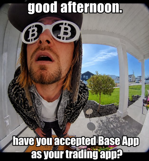 The image shows a man wearing Bitcoin sunglasses with a fisheye lens distortion, standing on a porch with the text "good afternoon." at the top and "have you accepted Base App as your trading app?" at the bottom. The exaggerated wide-angle perspective directly relates to the post's joke about whether someone would open the door for such a bizarre, distorted figure greeting them.