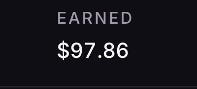 A dark screenshot displaying the text 'EARNED $97.86' in gray and white lettering.