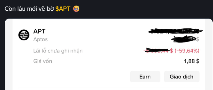 A screenshot in Vietnamese showing crypto earnings for 'APT' (Aptos) with a cost basis ('Giá vốn') of 1.88$, and handwritten black scribbles redacting some text; the title reads 'Còn lâu mới về bờ $APT 😨'.