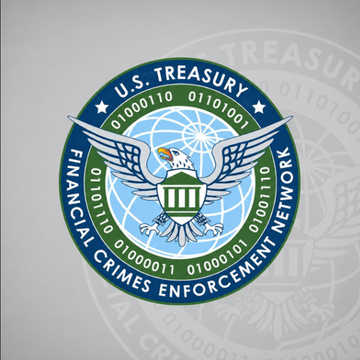 The image displays the official seal of the U.S. Treasury's Financial Crimes Enforcement Network (FinCEN), featuring a bald eagle over a globe encircled by binary code and the agency's name. It accompanies a post announcing FinCEN's identification of $12.7 billion linked to suspected crypto scams operated by Southeast Asian criminal organizations, based on an analysis of 33,904 reports filed between September 2023 and December 2025.
