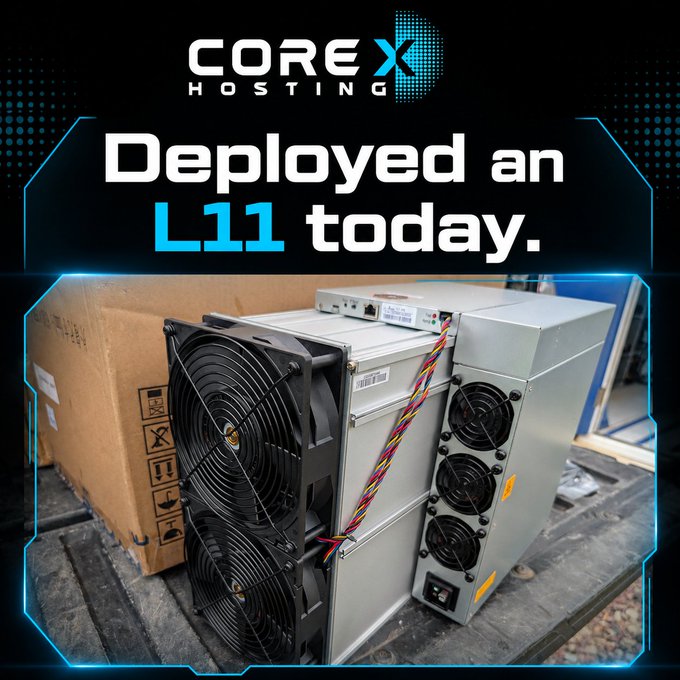 A promotional graphic for 'COREX HOSTING' featuring the text 'Deployed an L11 today' above a photo of cryptocurrency mining hardware, including an Antminer with cooling fans and a power supply unit, sitting on a wooden pallet.