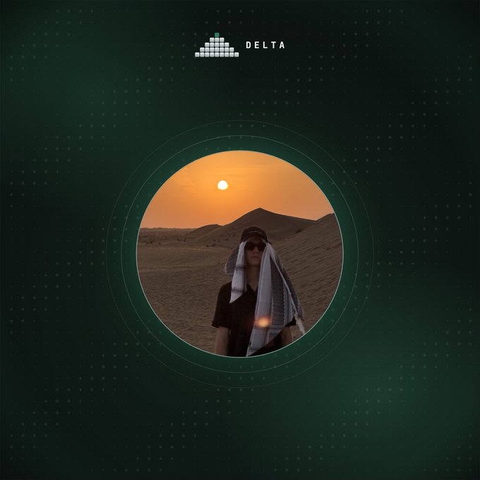 A circular portrait shows a person wearing sunglasses and a keffiyeh draped over their head, standing in a desert landscape with sand dunes and a setting (or rising) sun in the background. The image is set against a dark green dotted background featuring the "DELTA" logo at the top, with a pyramid/triangle icon next to it, visually introducing the new advisor (@jave_gg) joining the Delta team as mentioned in the post.