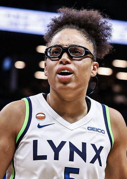 Minnesota Lynx #5, identified as WNBA Rookie of the Year Olivia Miles, is shown on the court during the playoffs wearing clear protective goggles, following her team's historic loss as the first 1-seed eliminated by an 8-seed despite her contributions of 8.0 PPG, 5.0 RPG, 1.0 APG, and 20% FG.