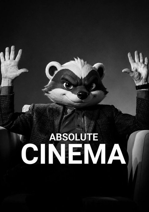 A black and white image of a person wearing a raccoon mask with hands raised, captioned 'ABSOLUTE CINEMA'.