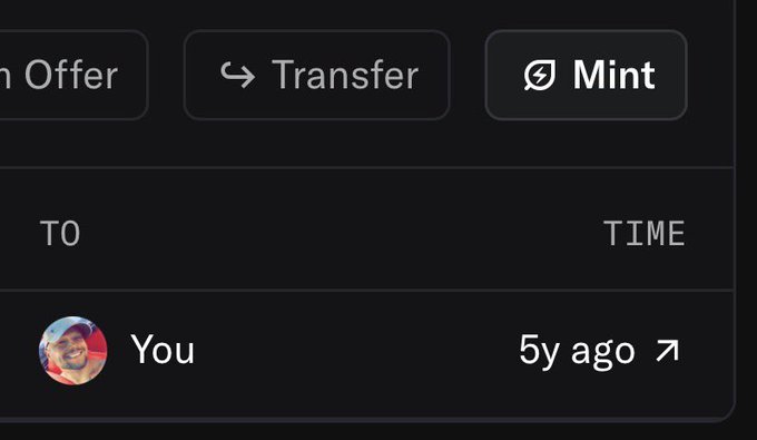 A dark-themed interface displays tabs for "Transfer" and "Mint" alongside a transaction history showing "You" minted a piece titled "Night Wood" five years ago (5y ago ↗). The displayed timestamp corresponds to the caption's "Minted 5 years ago" detail, indicating the user as the minter of this 1/1 photography piece originally purchased for 0.69 Ξ.