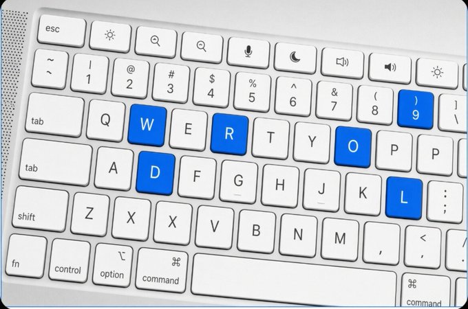 A close-up of a white laptop keyboard highlights the keys "W-O-R-L-D" in blue, spelling out "WORLD" to emphasize the accompanying post's claim that "Solana is the world of the future," tying the visual directly to the @world_xyz reference.