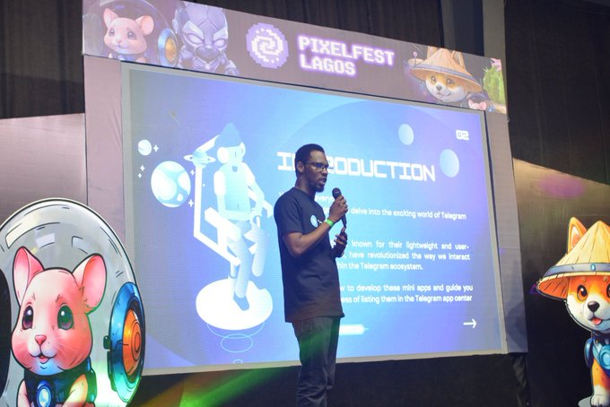 A man speaks at PixelFest Lagos with a "TELEGRAM INTRODUCTION" slide displayed behind him, alongside cartoon cat and dog mascots. The image relates to the post as the speaker is presenting on Telegram's mini-app ecosystem, a platform sometimes used in crypto circles where scams like "rugs" discussed in the post occur.