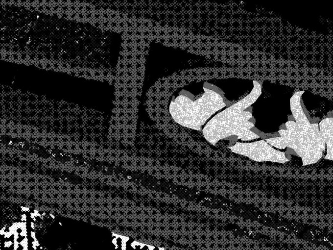 A heavily distorted, glitchy black and white image showing what appears to be a cartoon character, possibly from Dragon Ball, with significant digital noise.
