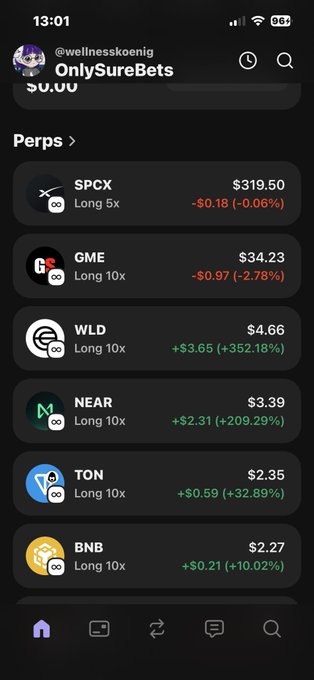 The image shows a phone screen with several stock market updates displayed, including Bitcoin prices for various cryptocurrencies such as Bitcoin Cash, Bitcoin, and Ripple. The text "Only SureBets" is also visible on the screen.