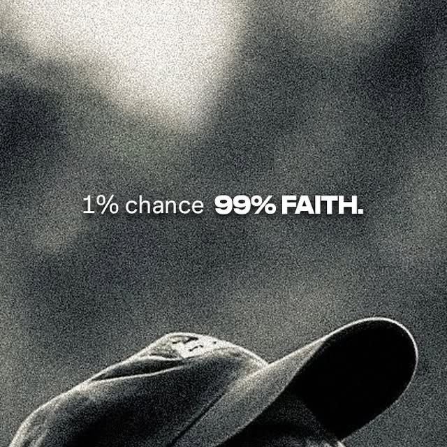 A black and white photo of a person wearing a hoodie with the text '1% chance 99% FAITH.' overlaid in the center.