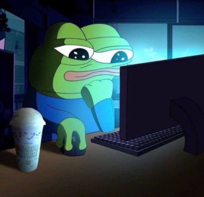 A meme of the sad Pepe the Frog character sitting at a computer desk, holding his chin and staring at the monitor with a Starbucks-style coffee cup beside him.